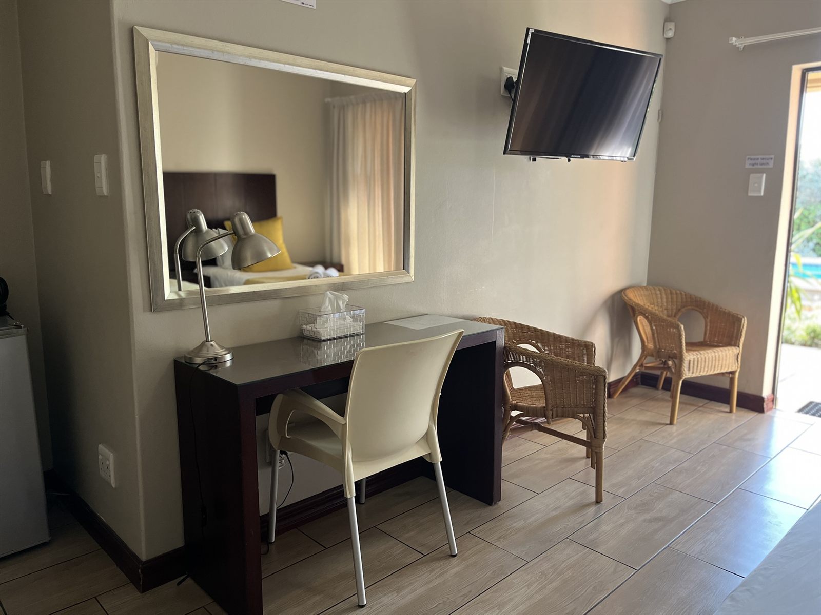 Standard Family Room desk, mirror and seating at Cozy Corner Brandwag
