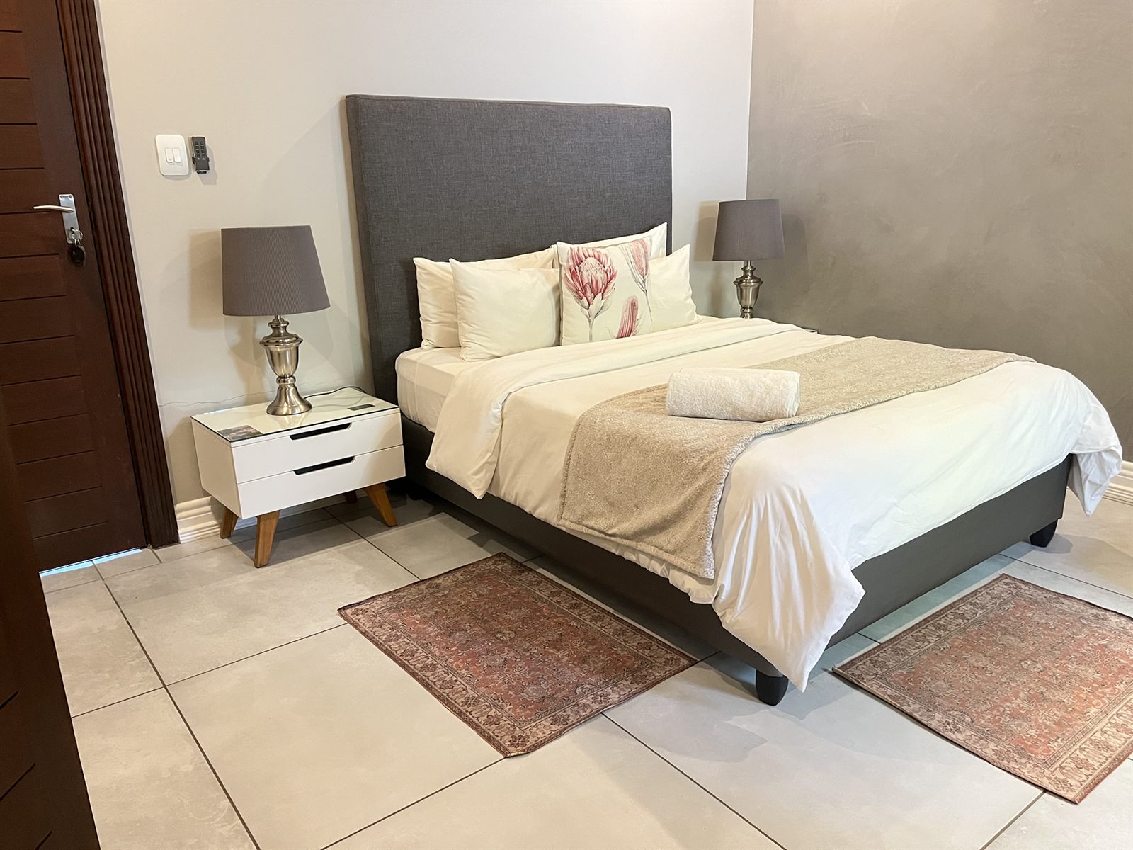 Classic Double Room bed and bedside table at 2nd Cozy Corner Woodland Hills