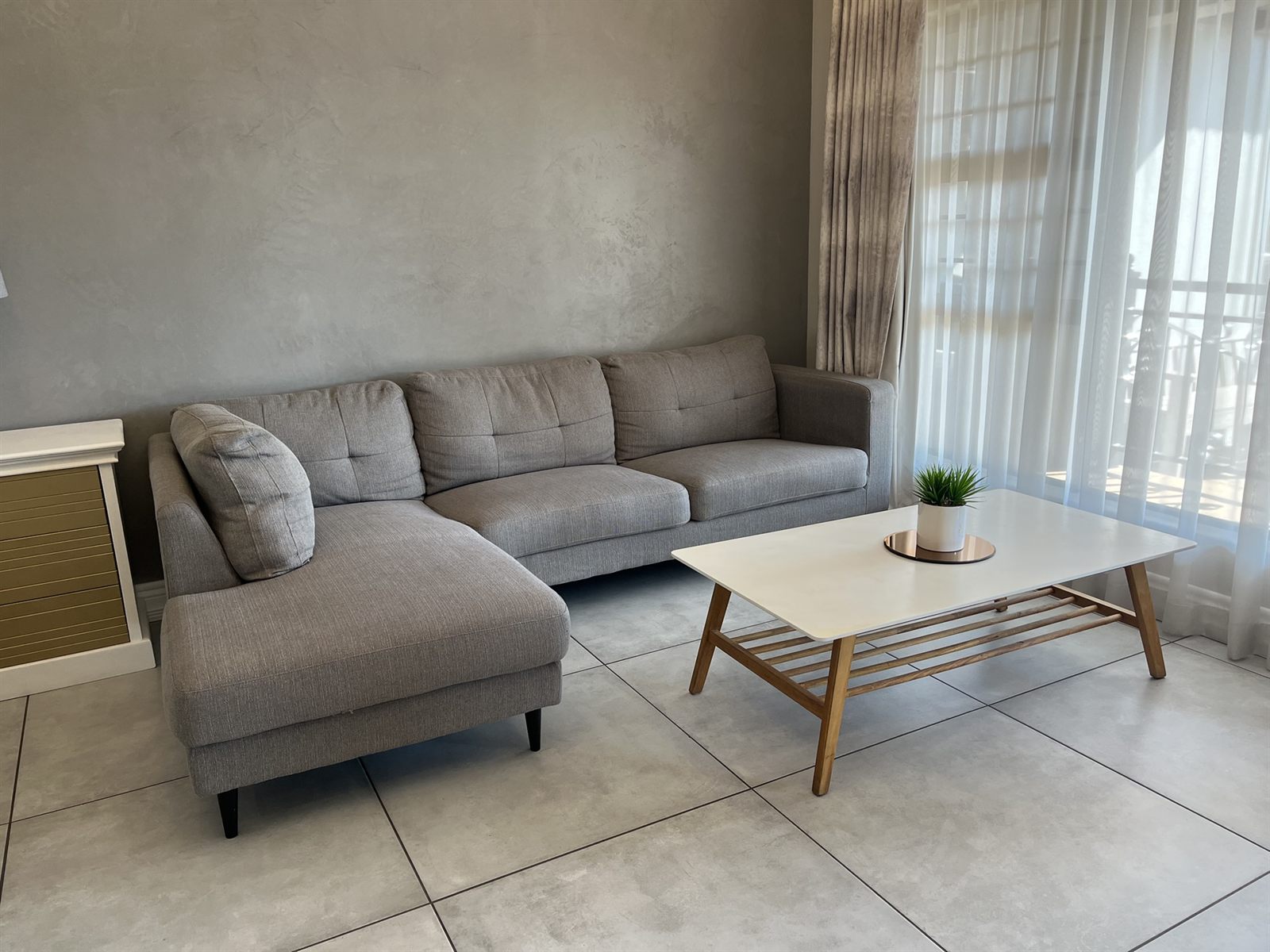 Executive Queen Room corner sofa and coffee table at 2nd Cozy Corner Woodland Hills